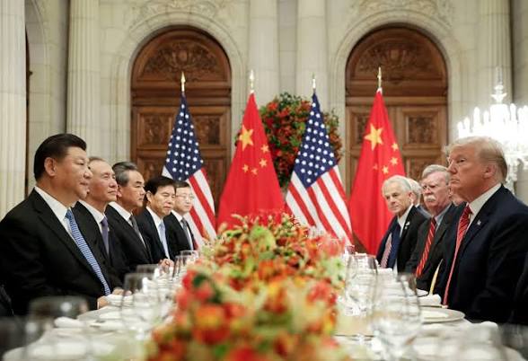 Unites state president and china president with world leaders during a meeting in china
