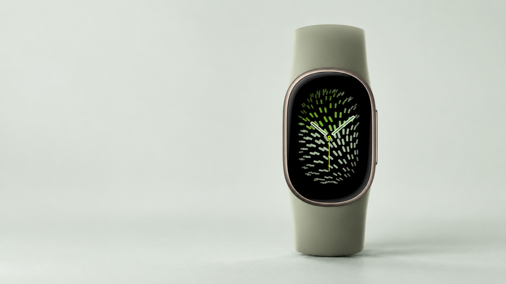 Sage-green fitness tracker with a black display, metallic bezel and green-accented analog-style watch face.